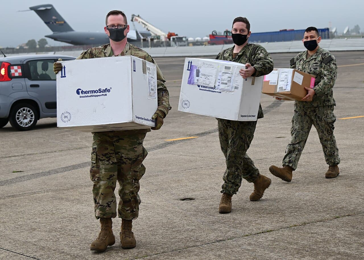 Palletized medical shipment being loaded for distribution